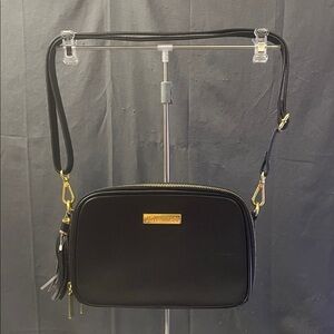 Elegant Black Crossbody Bag with Gold Accents